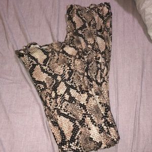 Snake print flare bottom pants